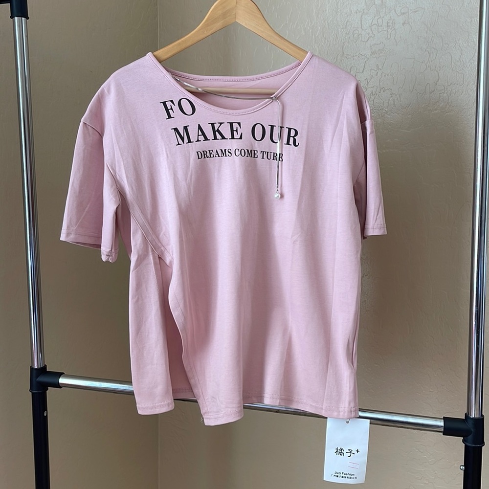 Cotton short sleeve . It’s really cute and soft